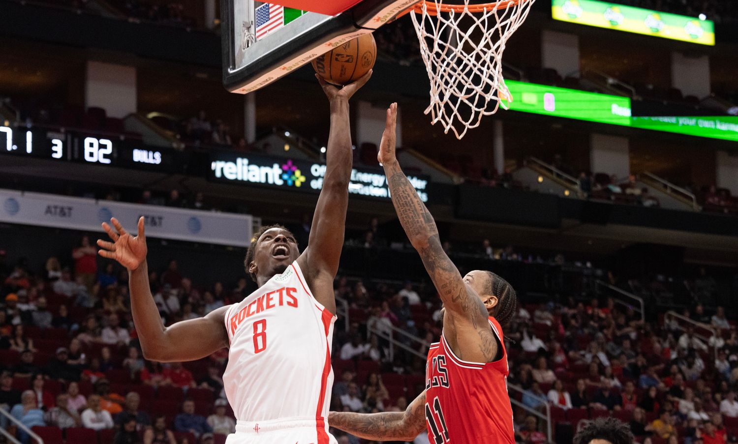 Rockets forward Jae'Sean Tate shoots against Chicago Bulls forward DeMar DeRozan (11) in the fourth quarter at Toyota Center.